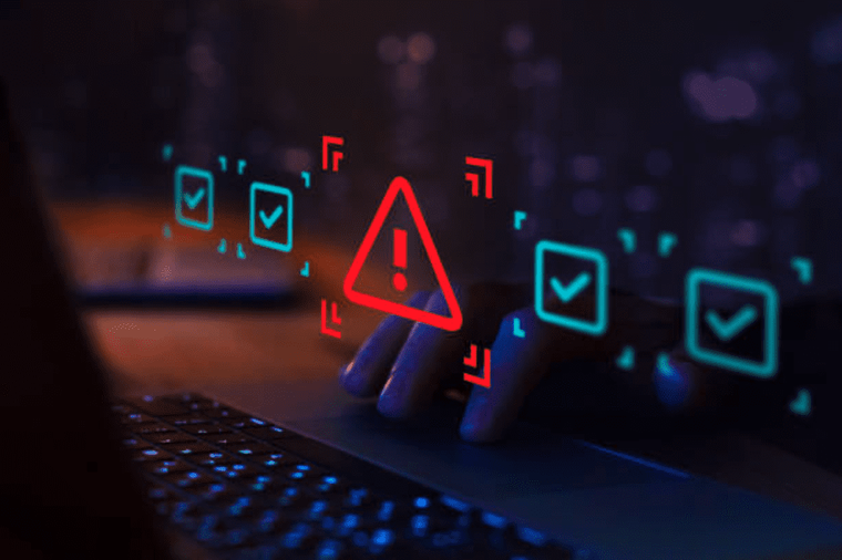 Red warning alert on a digital screen signaling a security breach or compliance error.