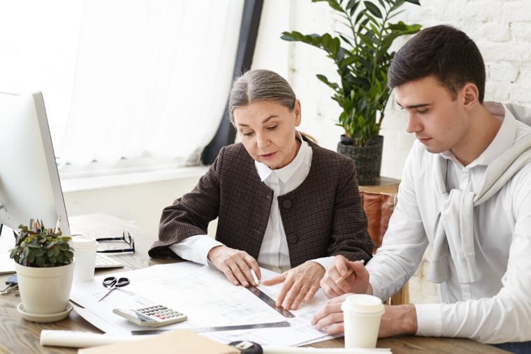 A tax advisor sat with a client planning their year-round taxes.