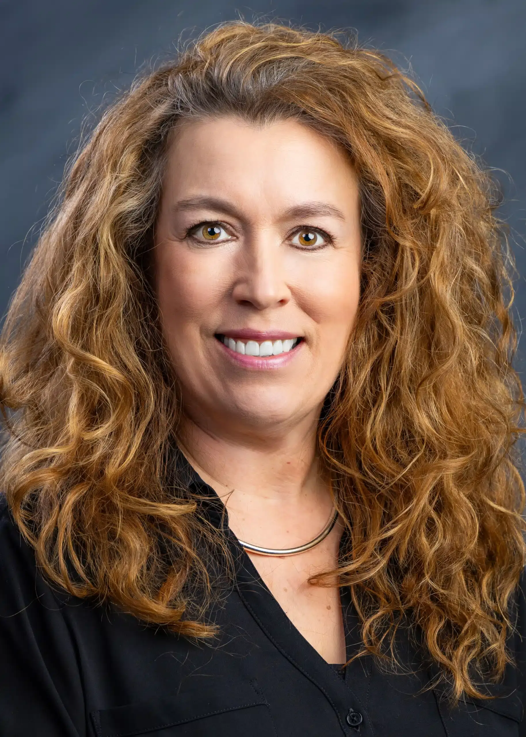 a person with long curly hair