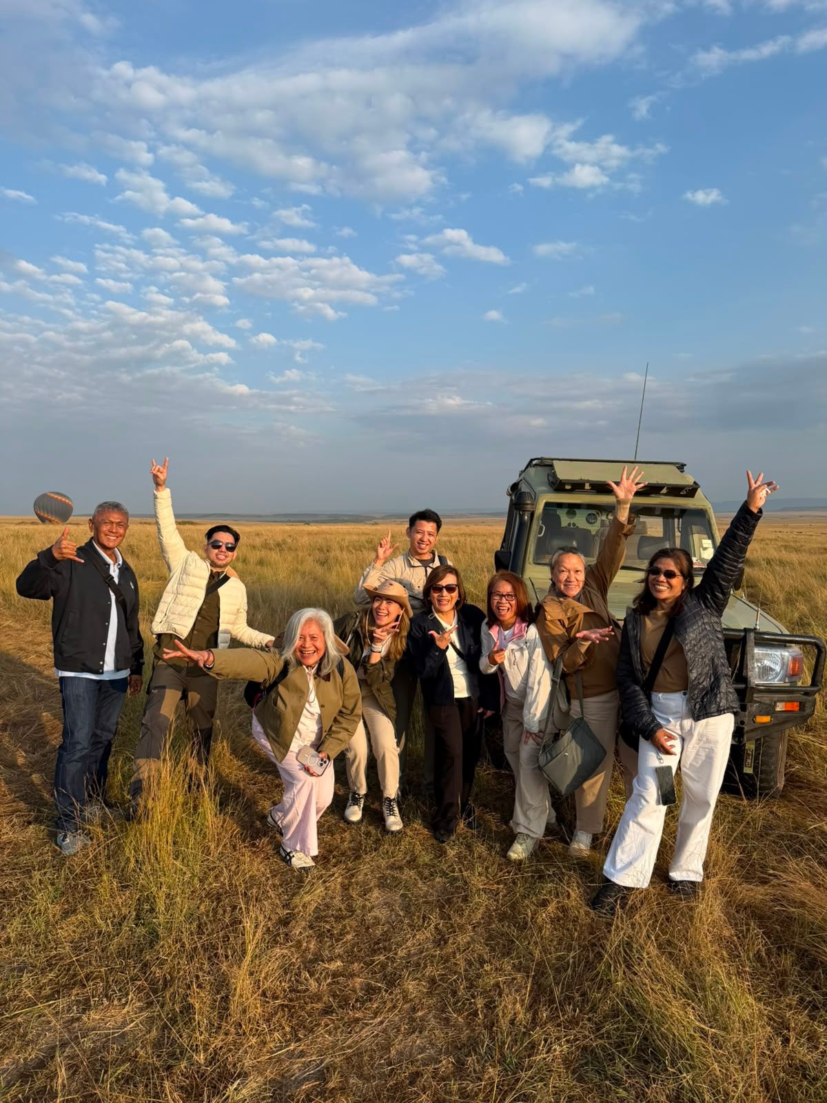 Corporate incentive group enjoying an outdoor bush dinner during a MICE programme in Kenya