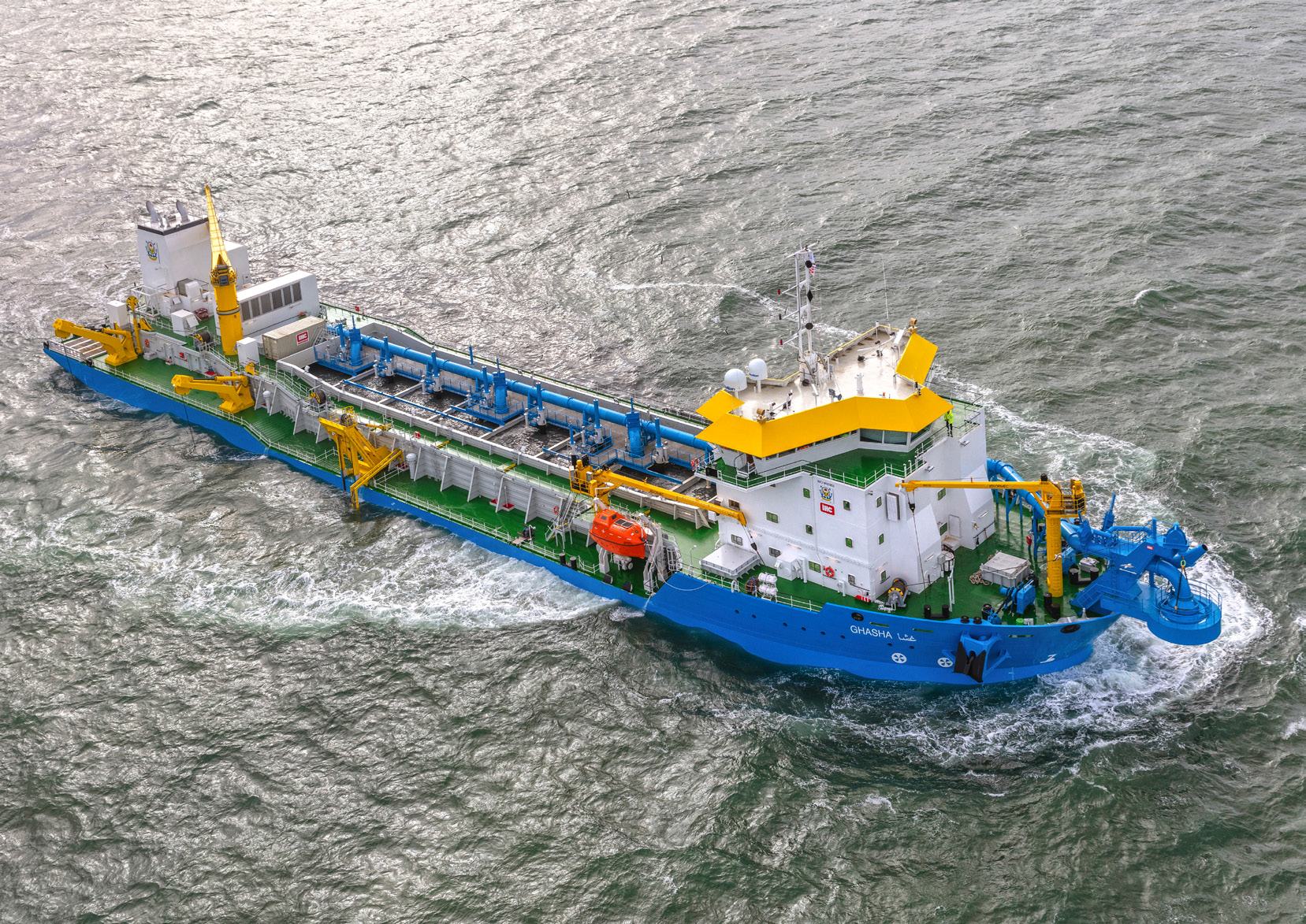 Dredging vessel operating at sea