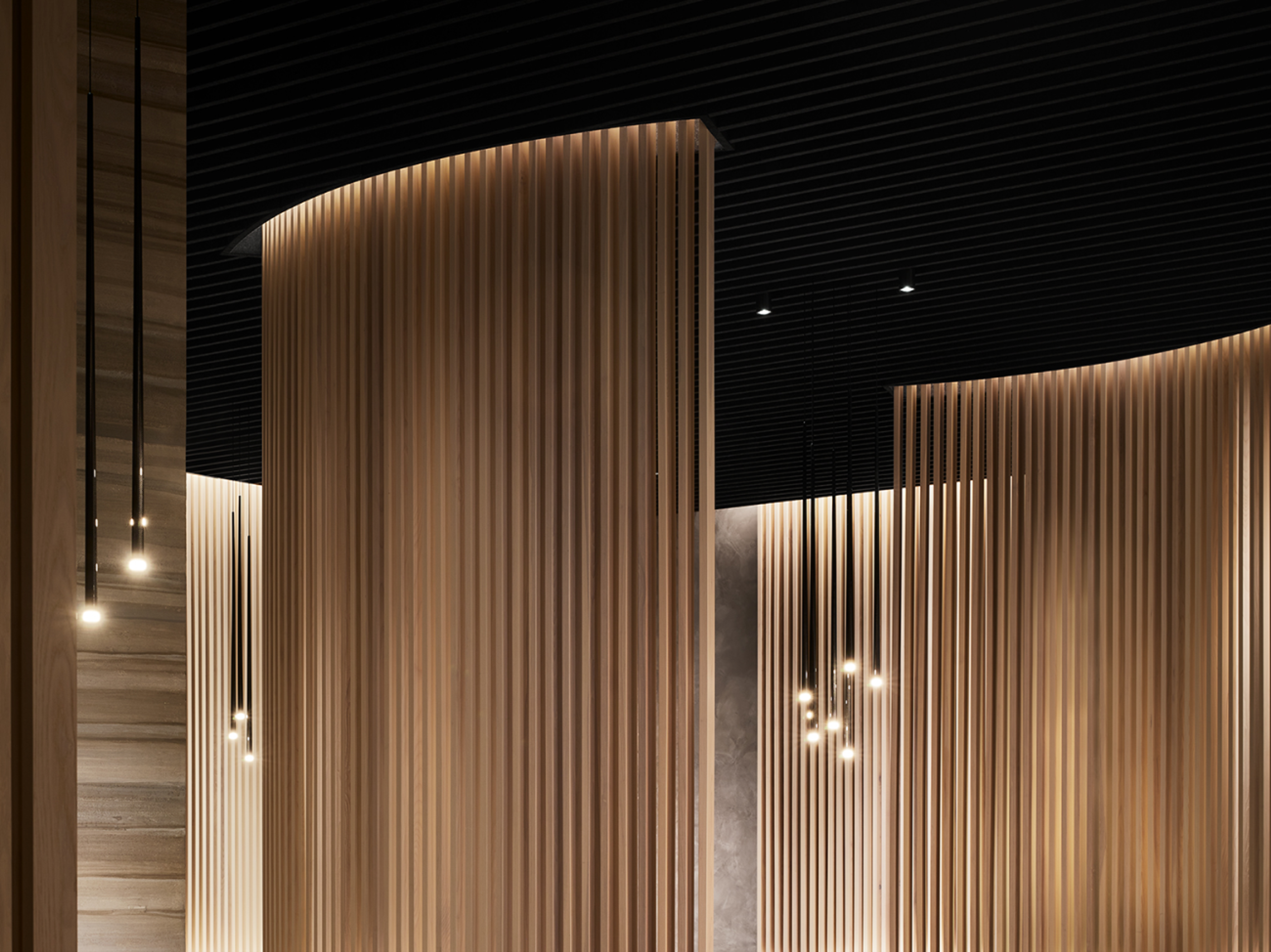 Turf's Datum baffles coordinated around wood panel fixtures at Ever Restaurant in Chicago.