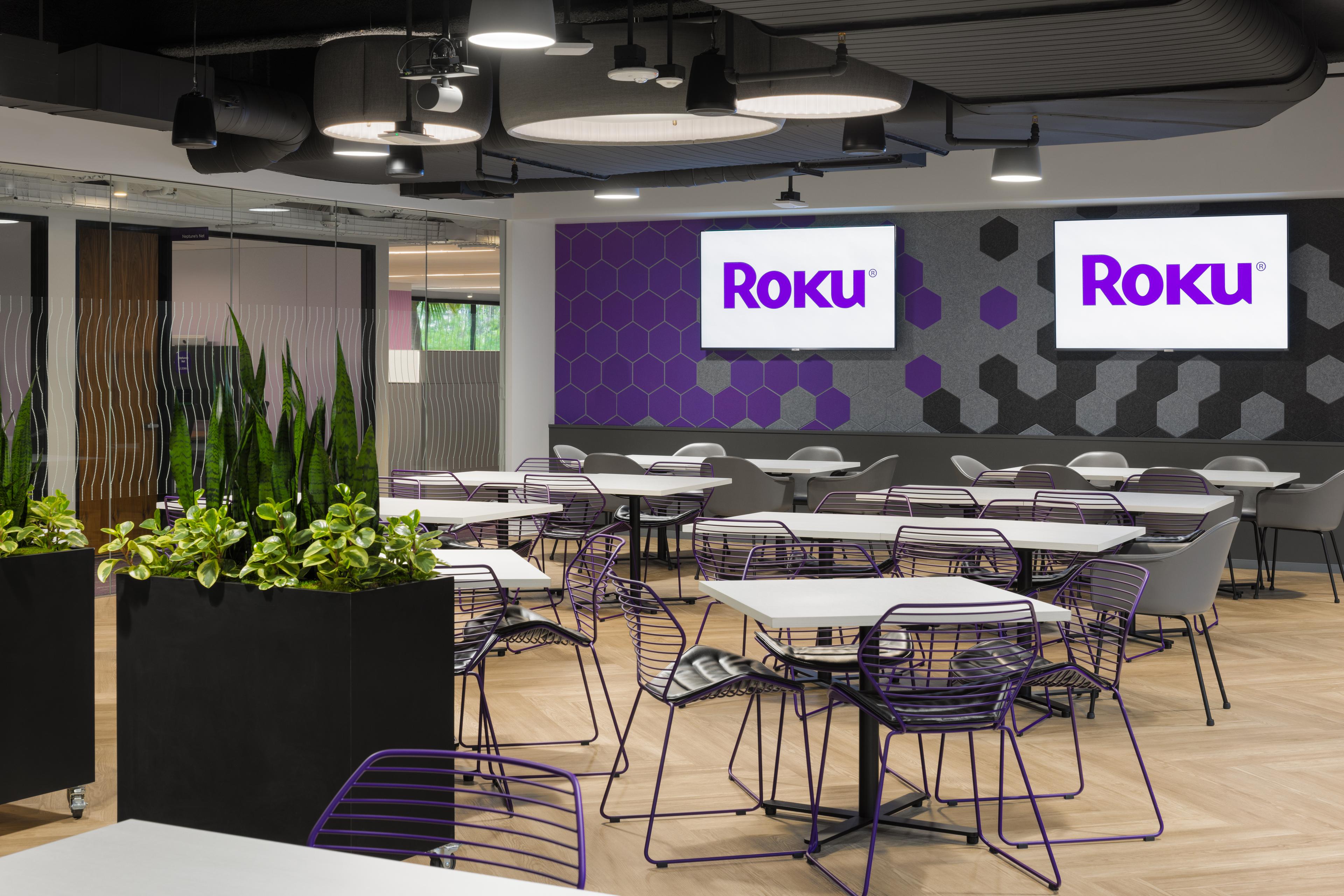 Roku's office with patterned purple, grey, charcoal Turf Hex acoustic wall tiles.