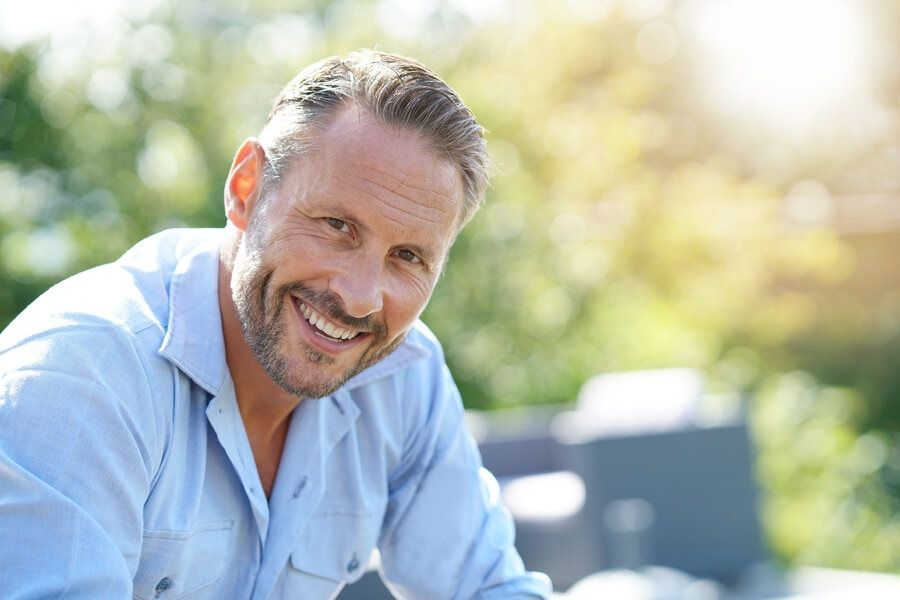 Attractive senior man has great teeth after restorative dentistry treatments in Mountain View
