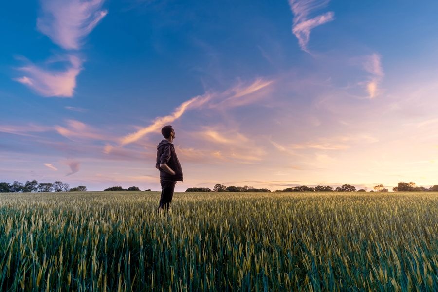 man looking at sky