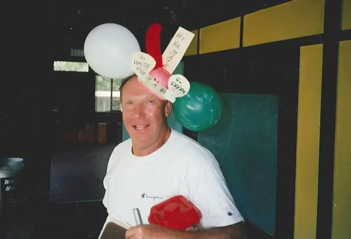 vintage photo of Hal Pinstein at Maplewood Camp wearing a silly balloon hat
