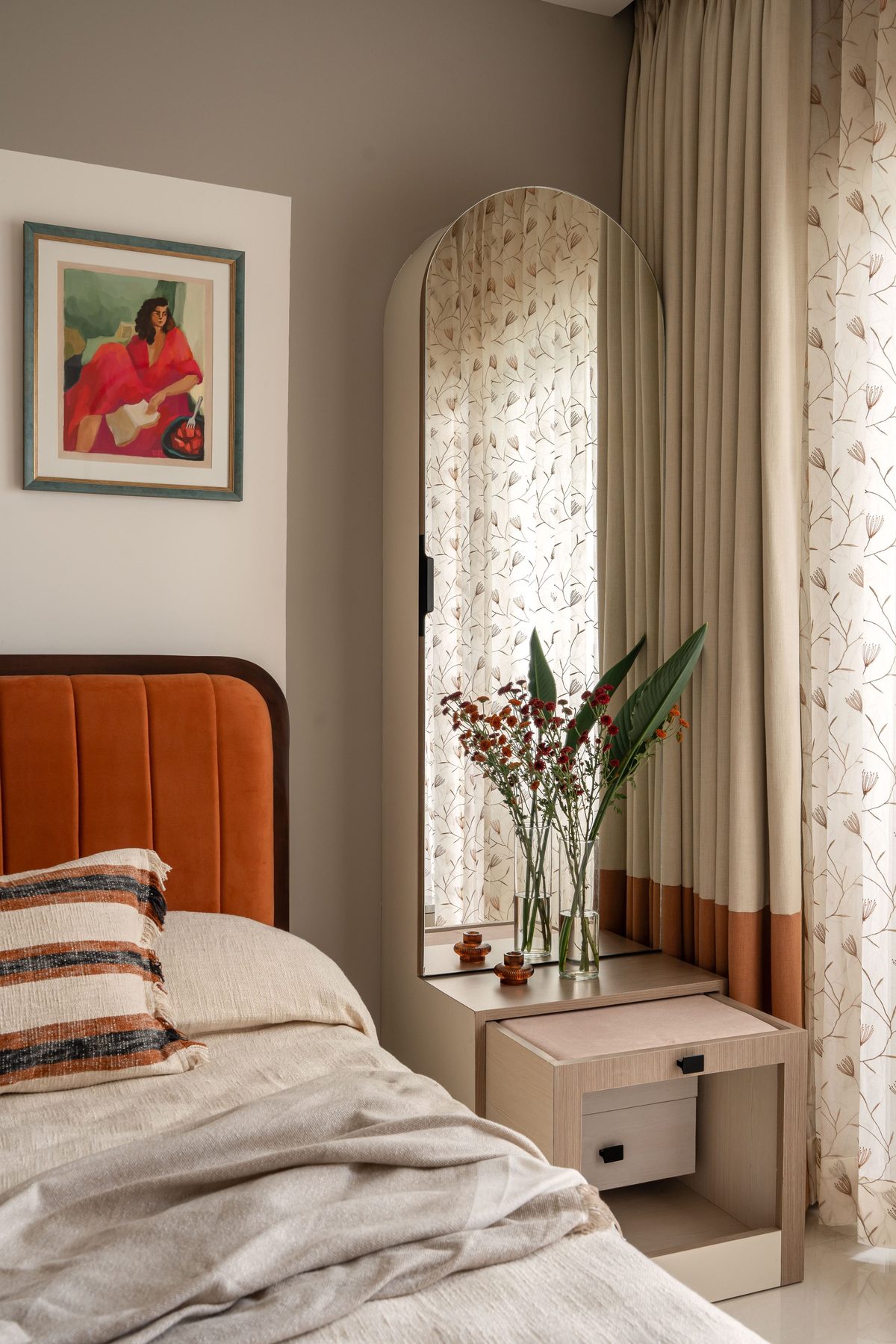 Bedroom with panelled bed-back and side units