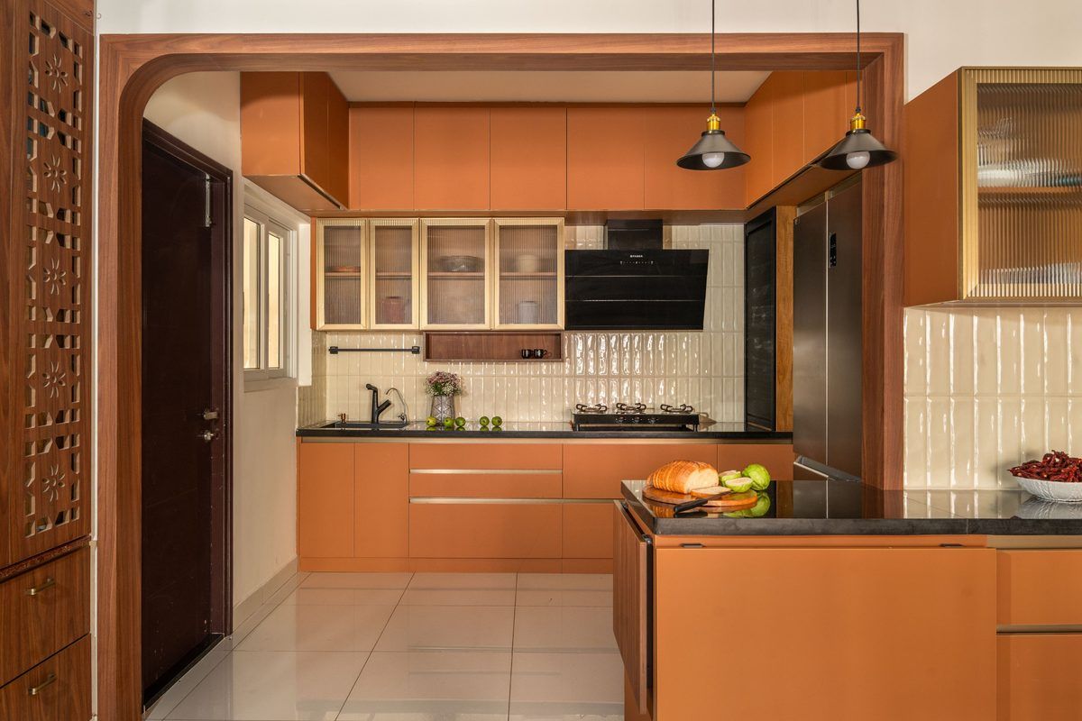 An amber PU kitchen with island and display shelving