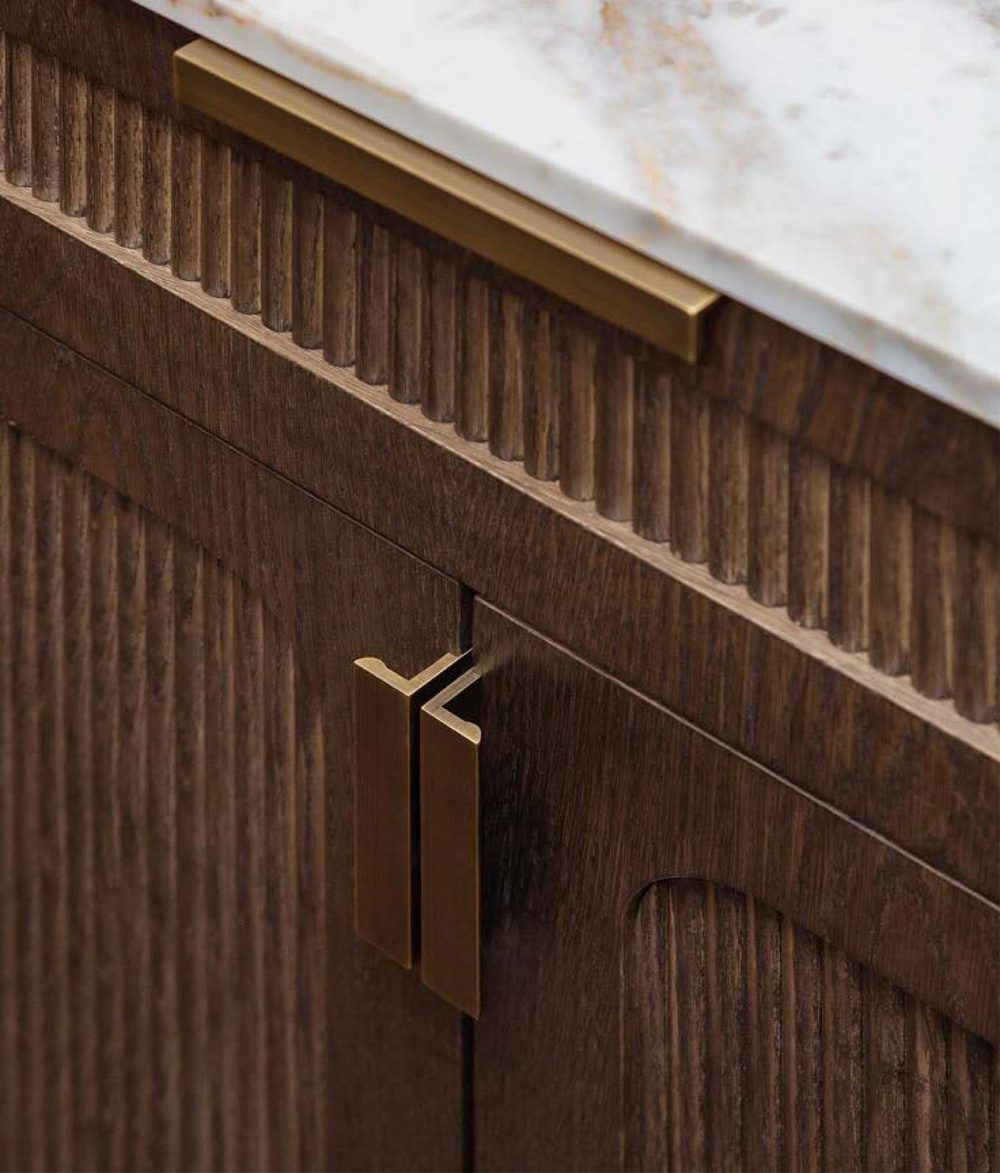Deep-groove fluted walnut PU shutter with brass edge pull