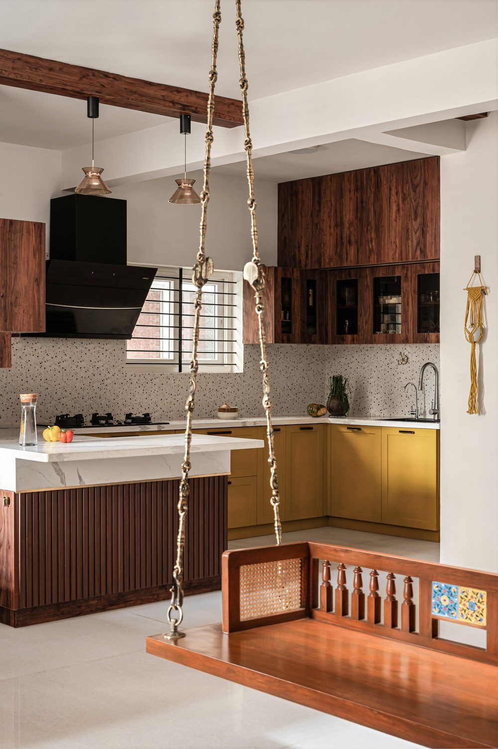 Walnut and green PU kitchen with brass rail details