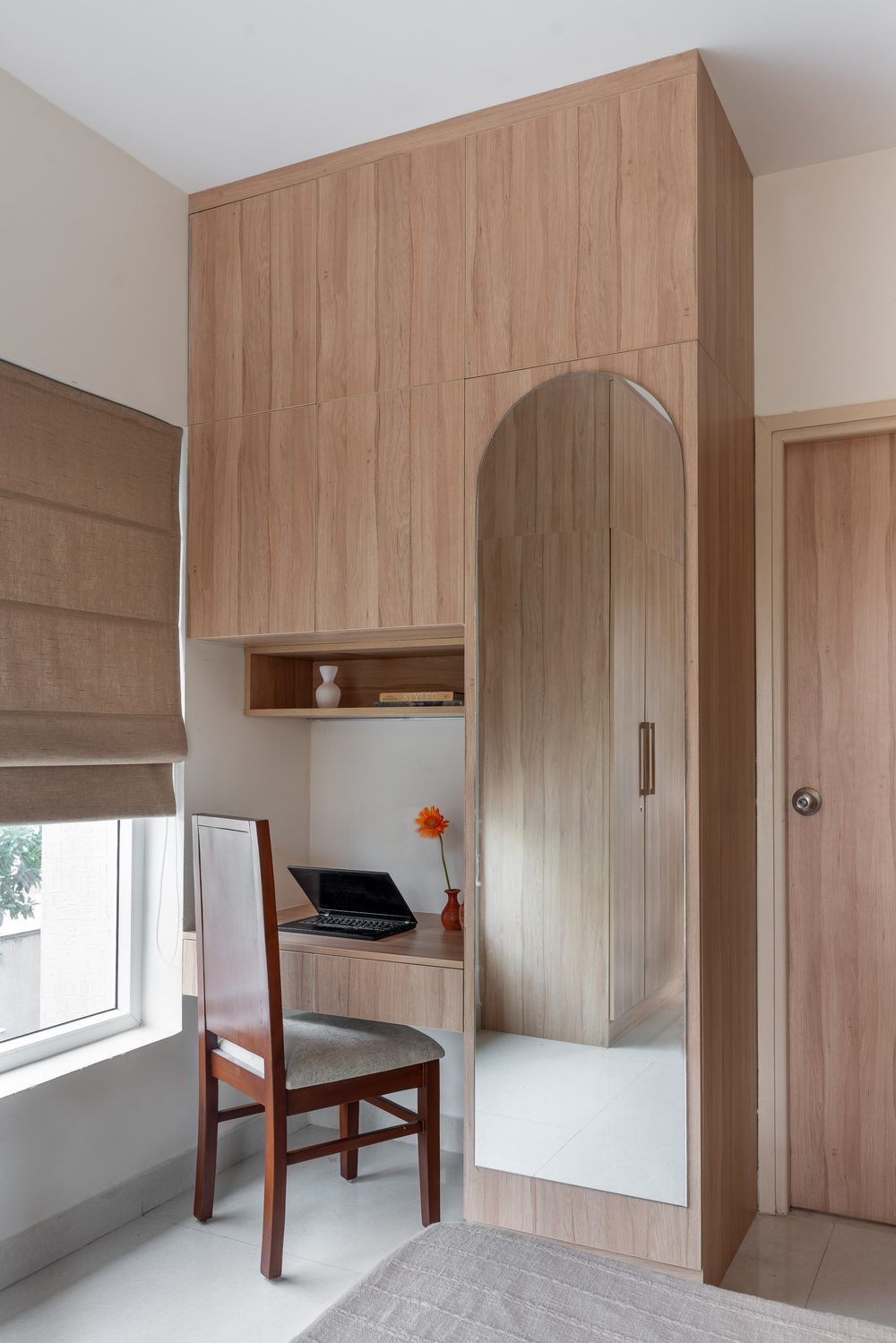 Arched cane and PU wardrobe doors in warm taupe