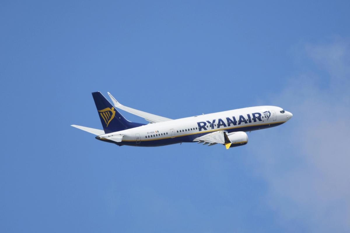 A Ryanair Boeing 737 aircraft in flight against a clear sky. Ryanair’s dependence on Boeing, despite its production issues and rising costs, highlights how interconnected the industry is and the need for stronger aerospace cost models that can seamlessly run numbers for myriad demand, political, compliance, and market scenarios.}