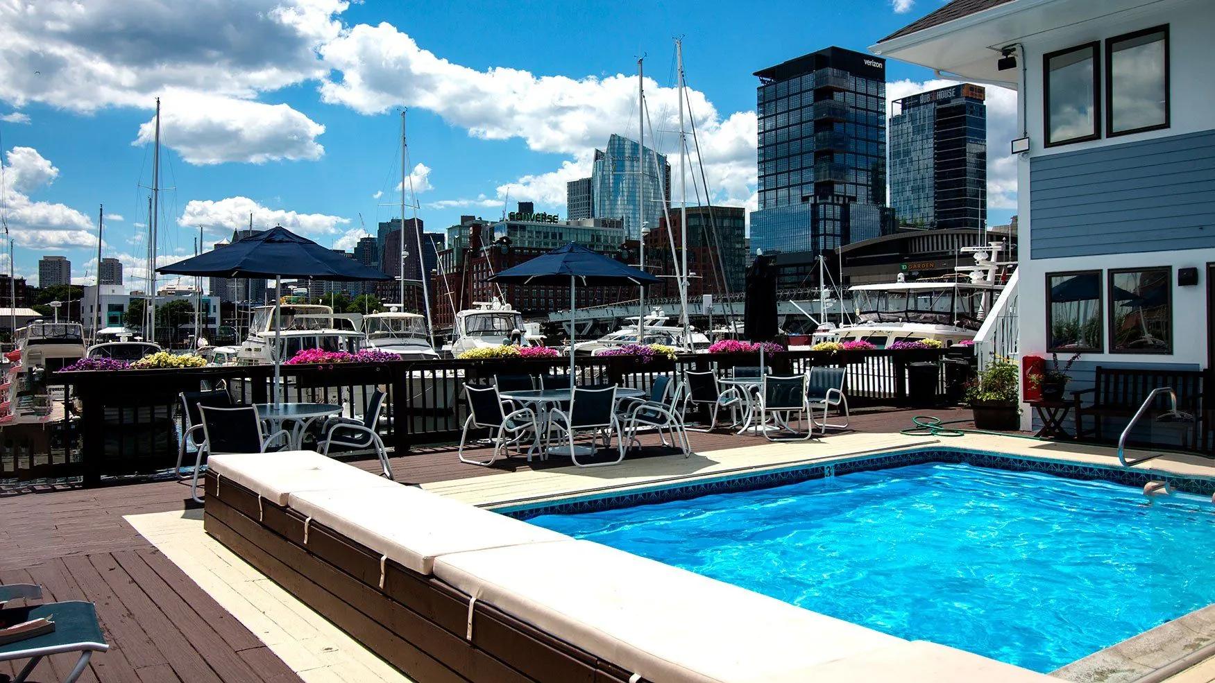 Swimming pool and sun deck beside the boats at Constitution Marina