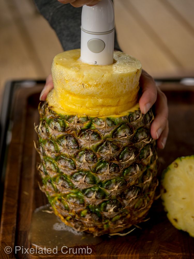 Slicing pineapple with OXO Pineapple Slicer