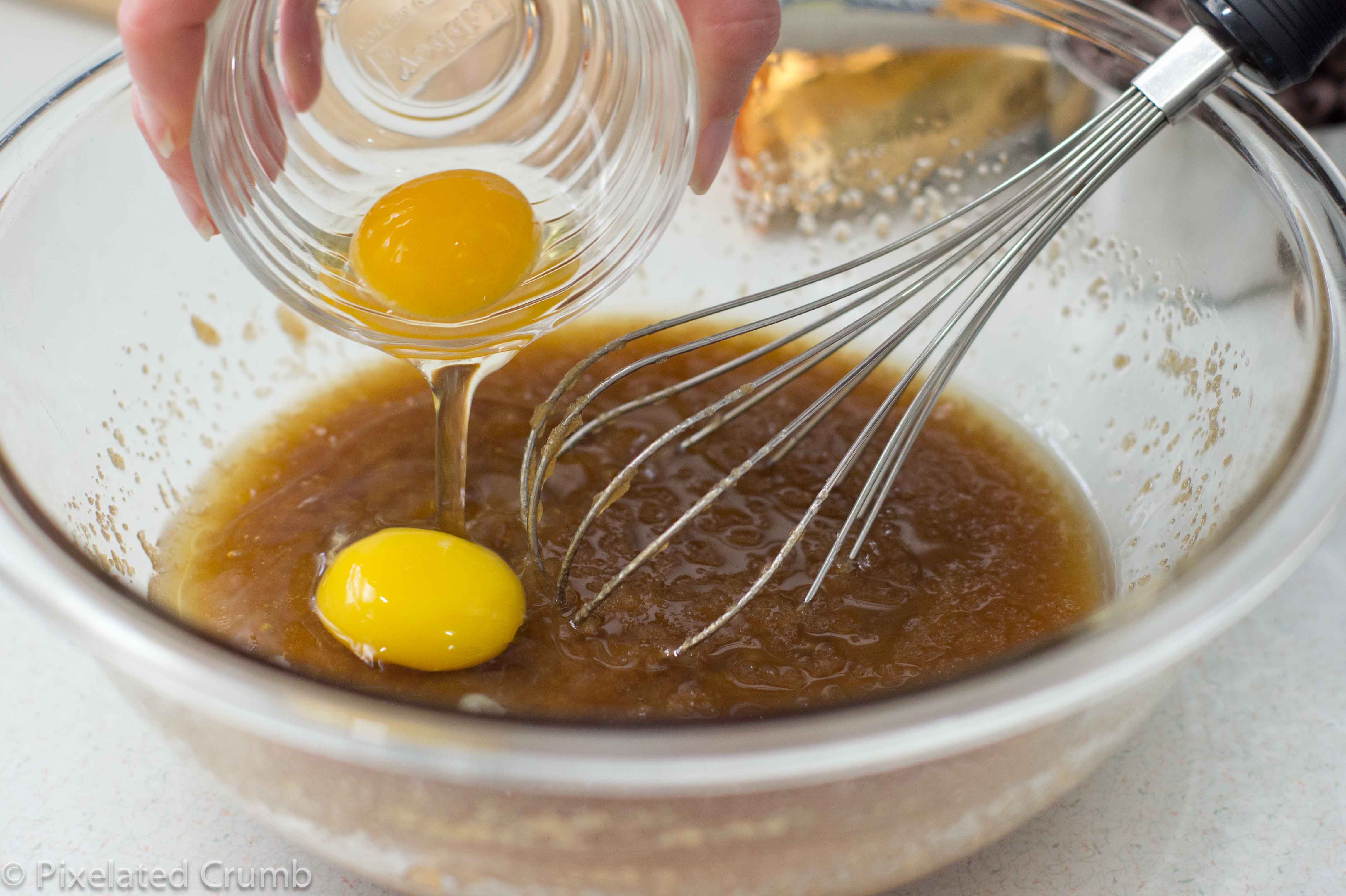 eggs into sugar and butter mixture