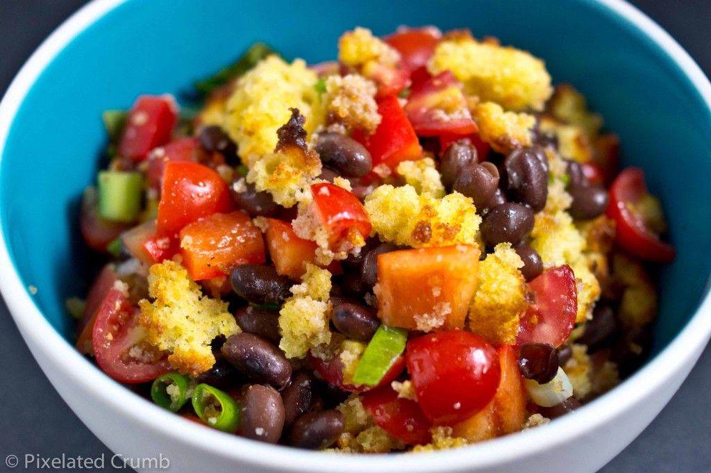 cornbread salad with black beans, red bell peppers, and cherry tomatoes