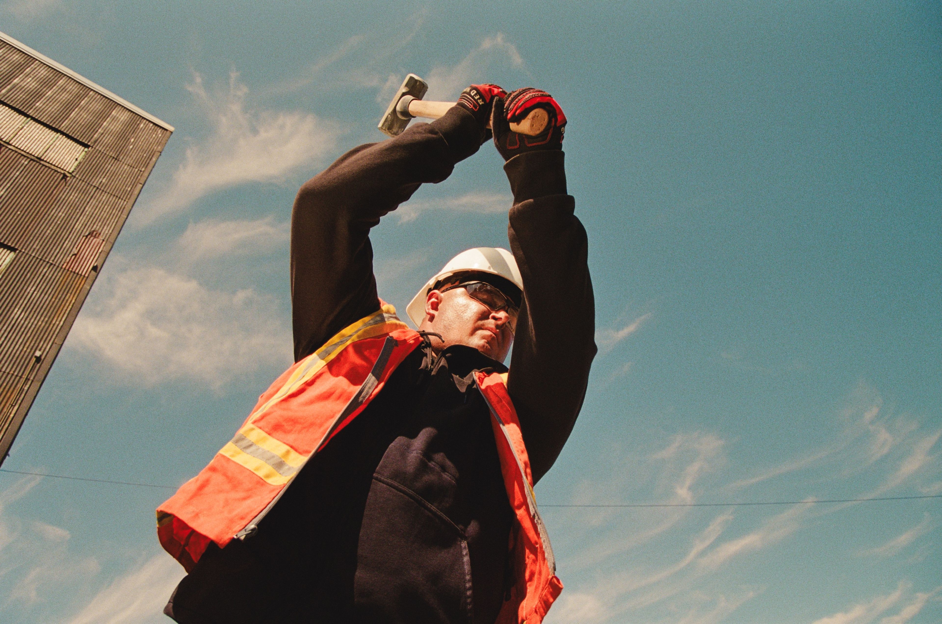 construction worker sledge hammer
