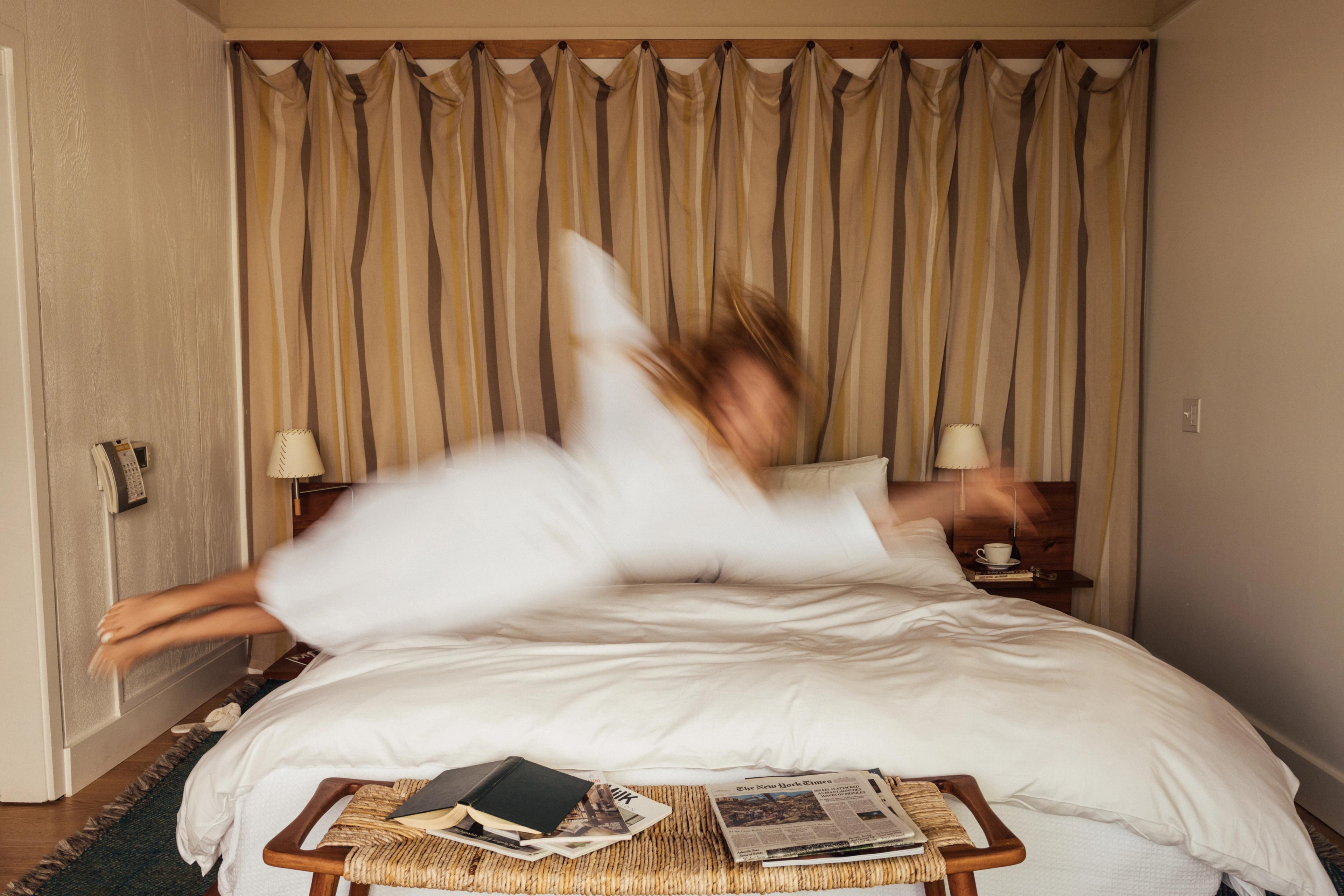 Diving into bed