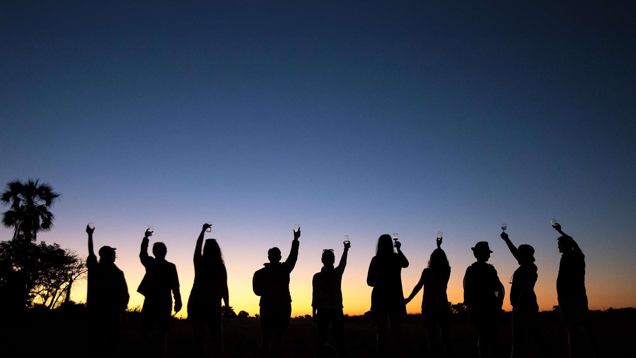 Safari Experiences Hero Sunset Toast Background Our travel experts team