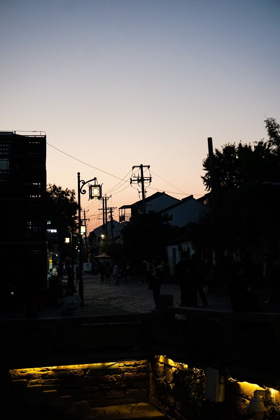 A town's building silhouette at dusk