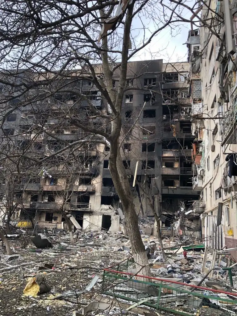Blackened apartment building facade from a blast