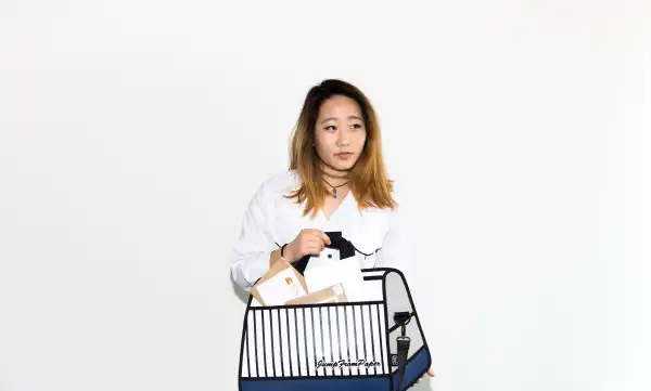 "The bag I'm holding is a) quirky and weird and delightful, which is something I take pride in in my personality and style, and b) filled with letters from my family. My family has supported me my whole life, and given me my own confidence that empowers me everyday." - Catt Kim #CELEBRATEWOMEN