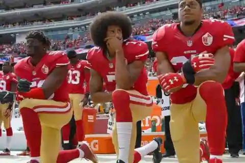 Football player kneeling