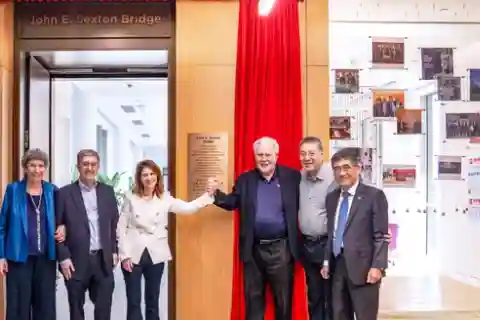 School leadership pose with President Linda Mills.