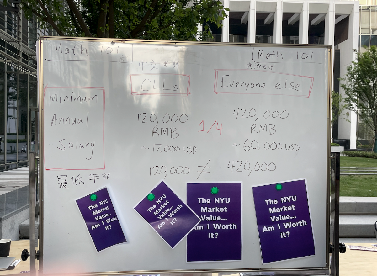 Whiteboard at the event that demonstrates the income disparity between income being made by Chinese Language Lectures and other faculty members.