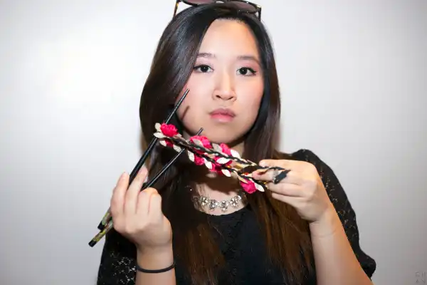 “I am empowered by my identity as a double minority. My identity as an Asian American (represented by the pair of chopsticks) and as a woman (represented by the string of flowers) is what keeps me running the race, a race not for relative progress, but absolute equality. This empowerment is what ceaselessly drives me to pursue my agenda in media communication - to eliminate bias - as well as what sustains the fire in my gut when I write, speak, and breathe.”- Grace Moon #CELEBRATEWOMEN