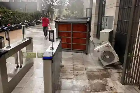 Guard post at the dorm entrances blown over by the storm winds.
