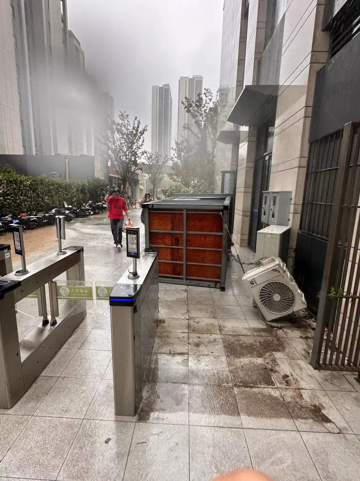 Guard post at the dorm entrances blown over by the storm winds.