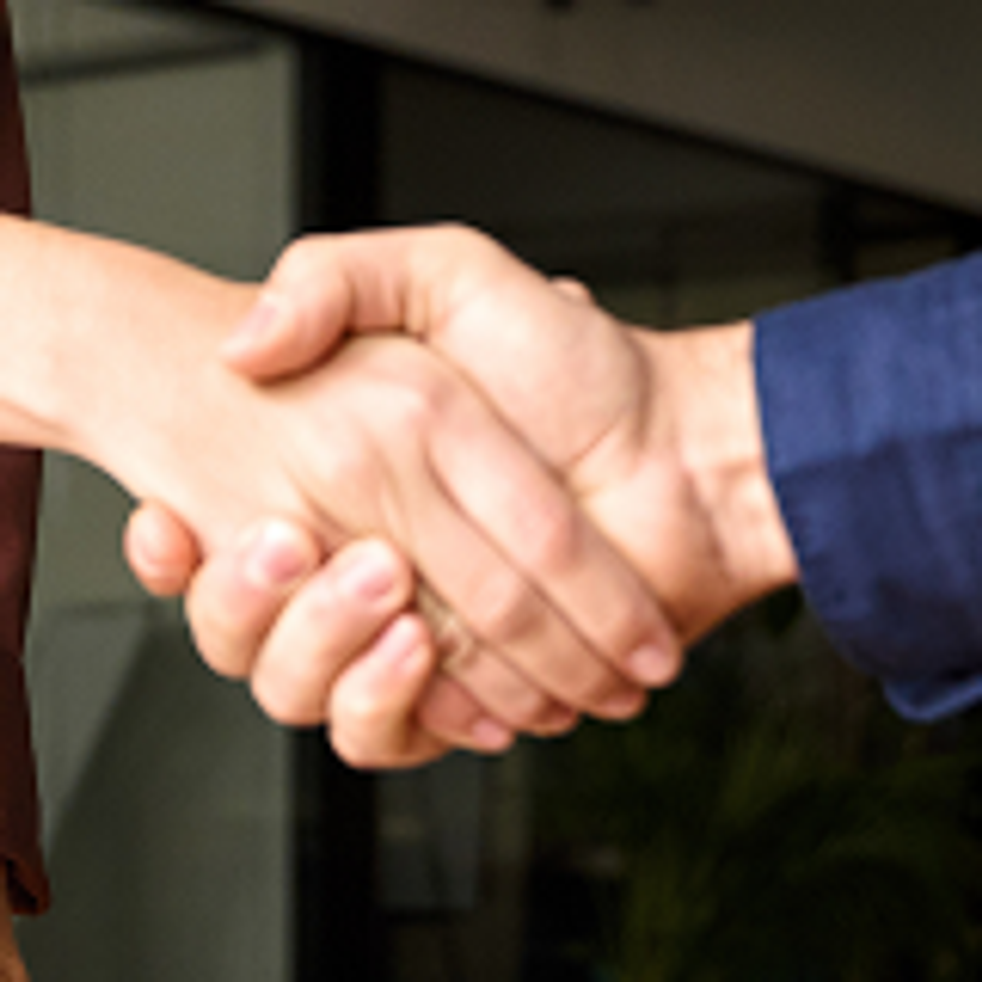 Hands together in a handshake