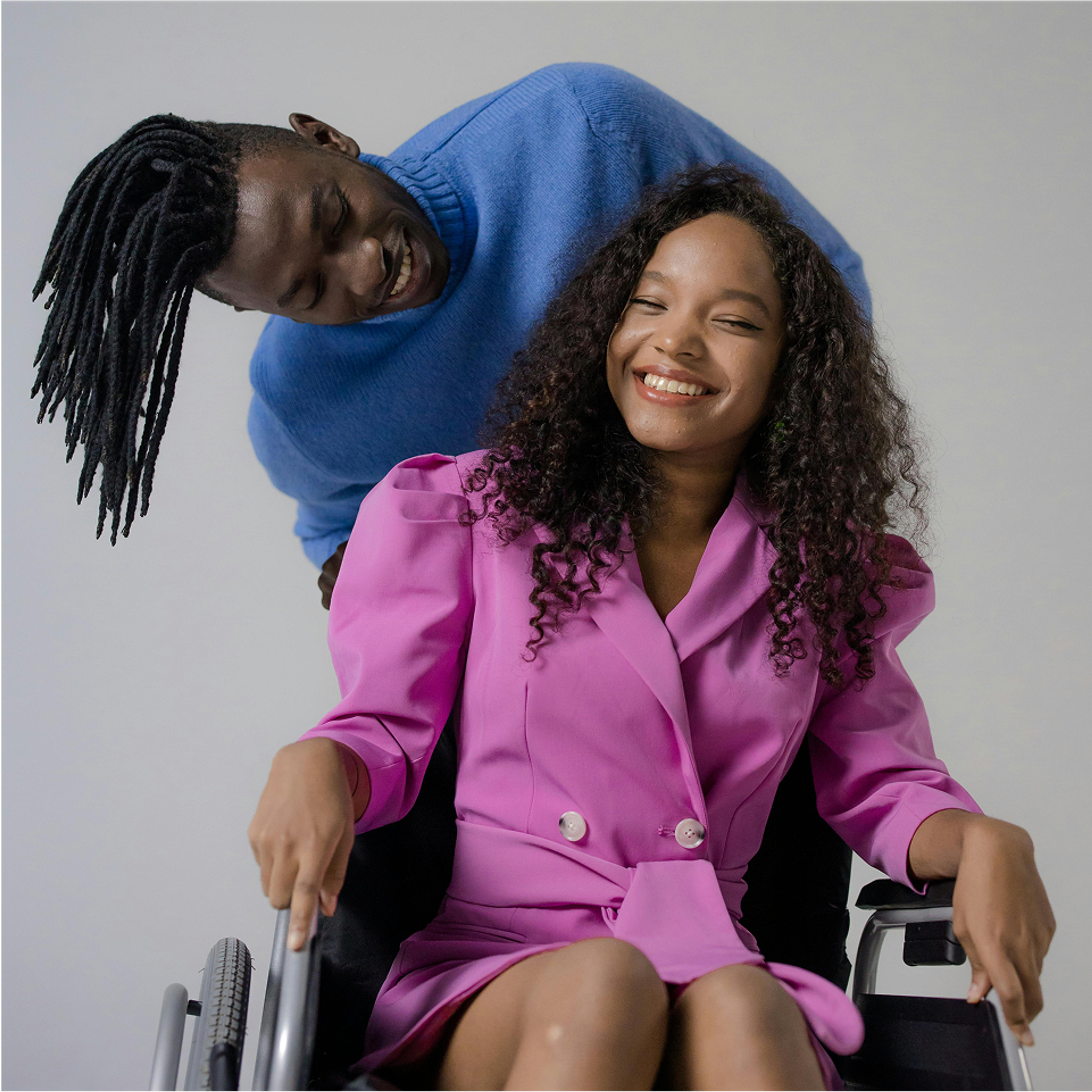 Woman in wheelchair with friend 
