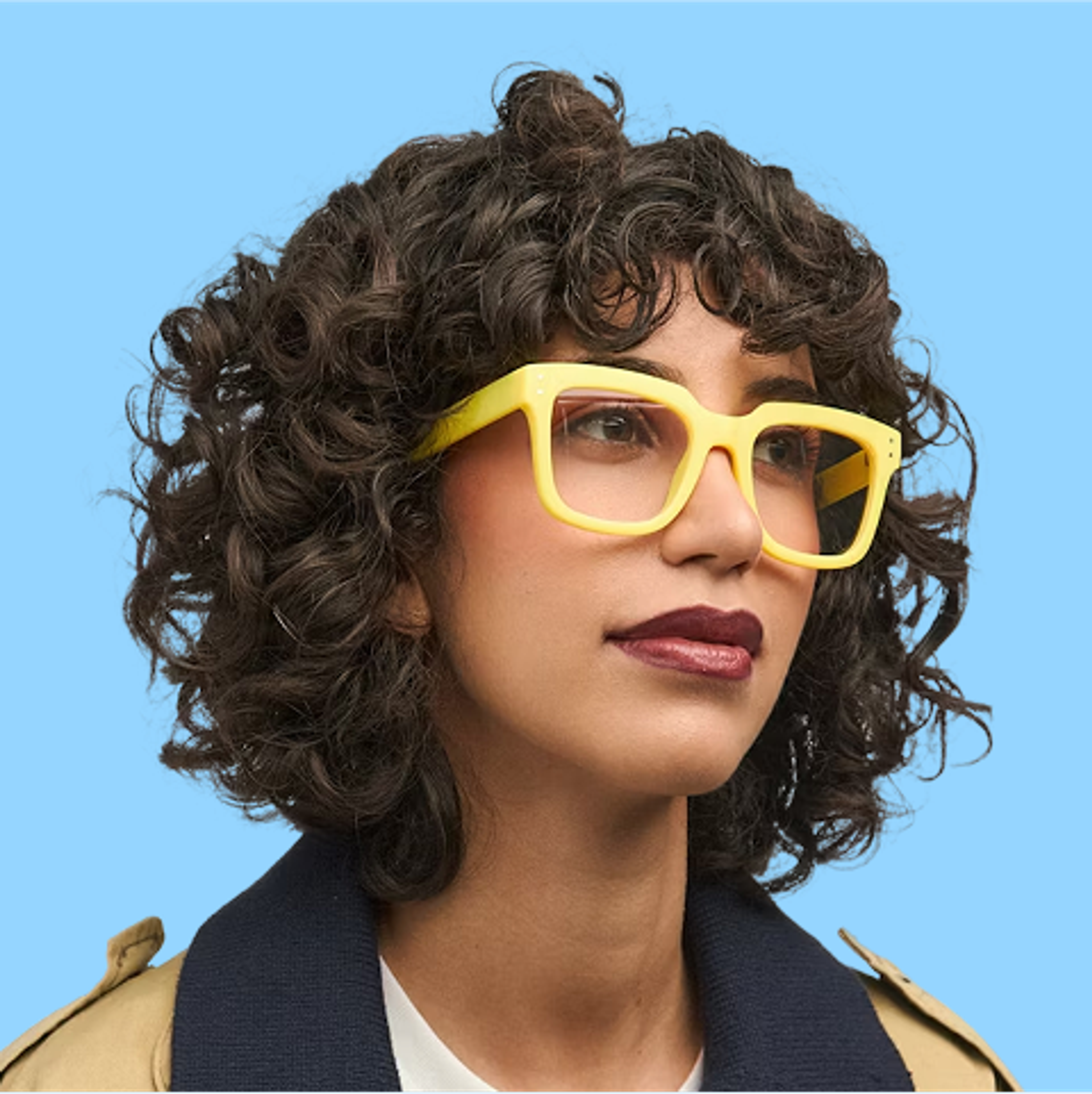Headshot of a woman wearing glasses