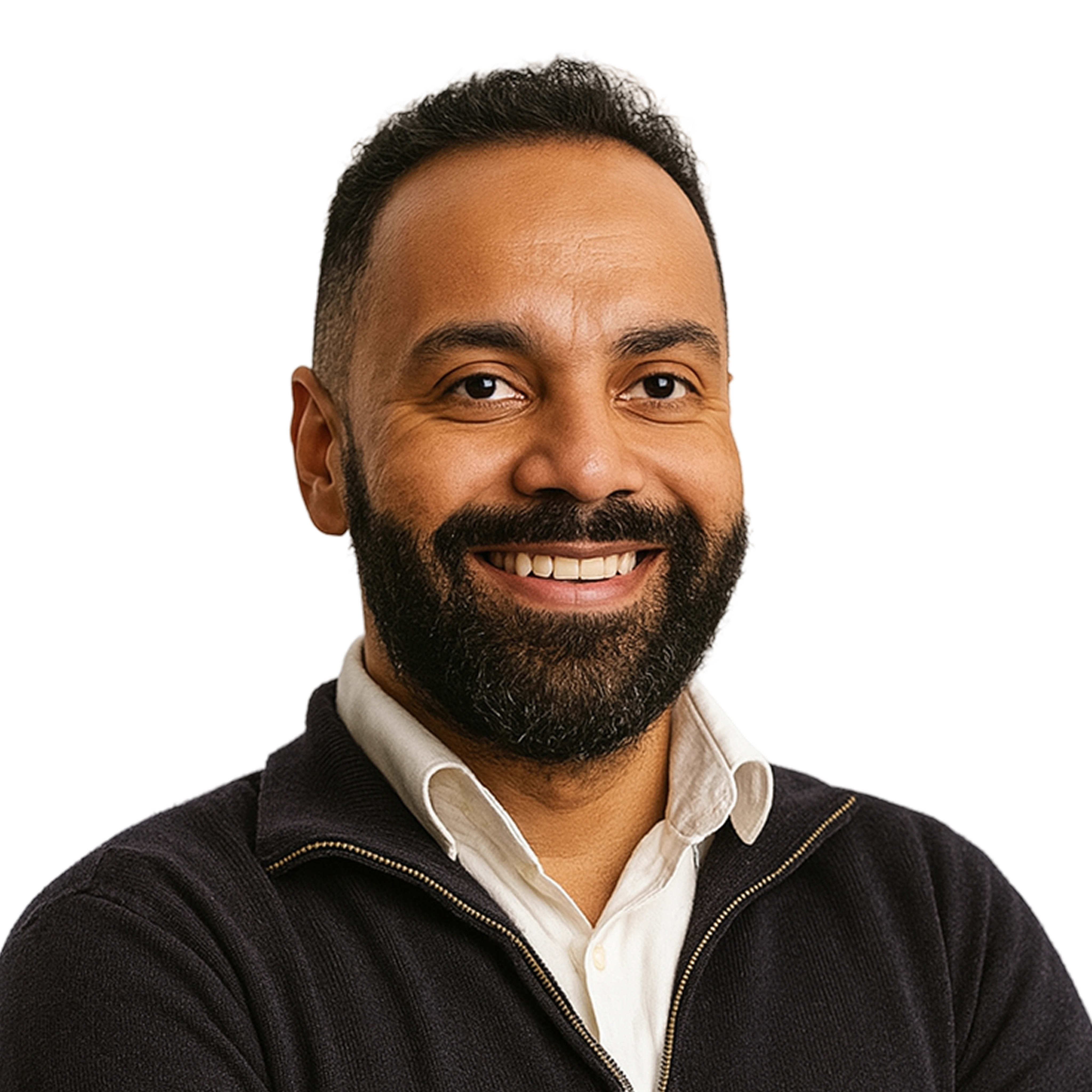 portrait photo of a smiling, bearded man