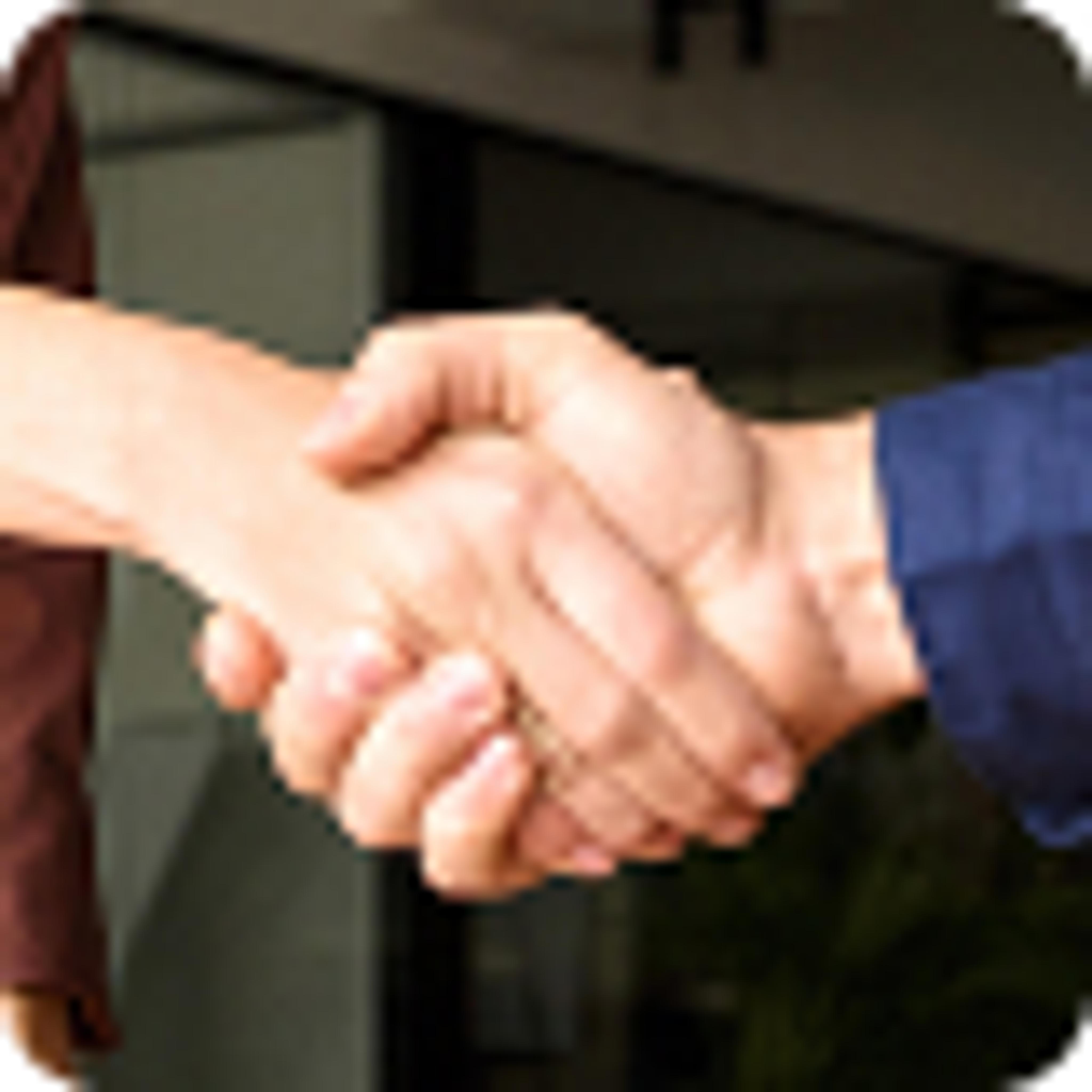 Two hands in a handshake.