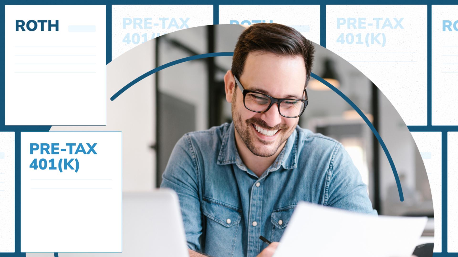 A man wearing glasses smiles while reviewing paperwork at a desk with a laptop. Graphic cards labeled “Roth” and “Pre-Tax 401(k)” appear in the background, suggesting a comparison of retirement contribution options.