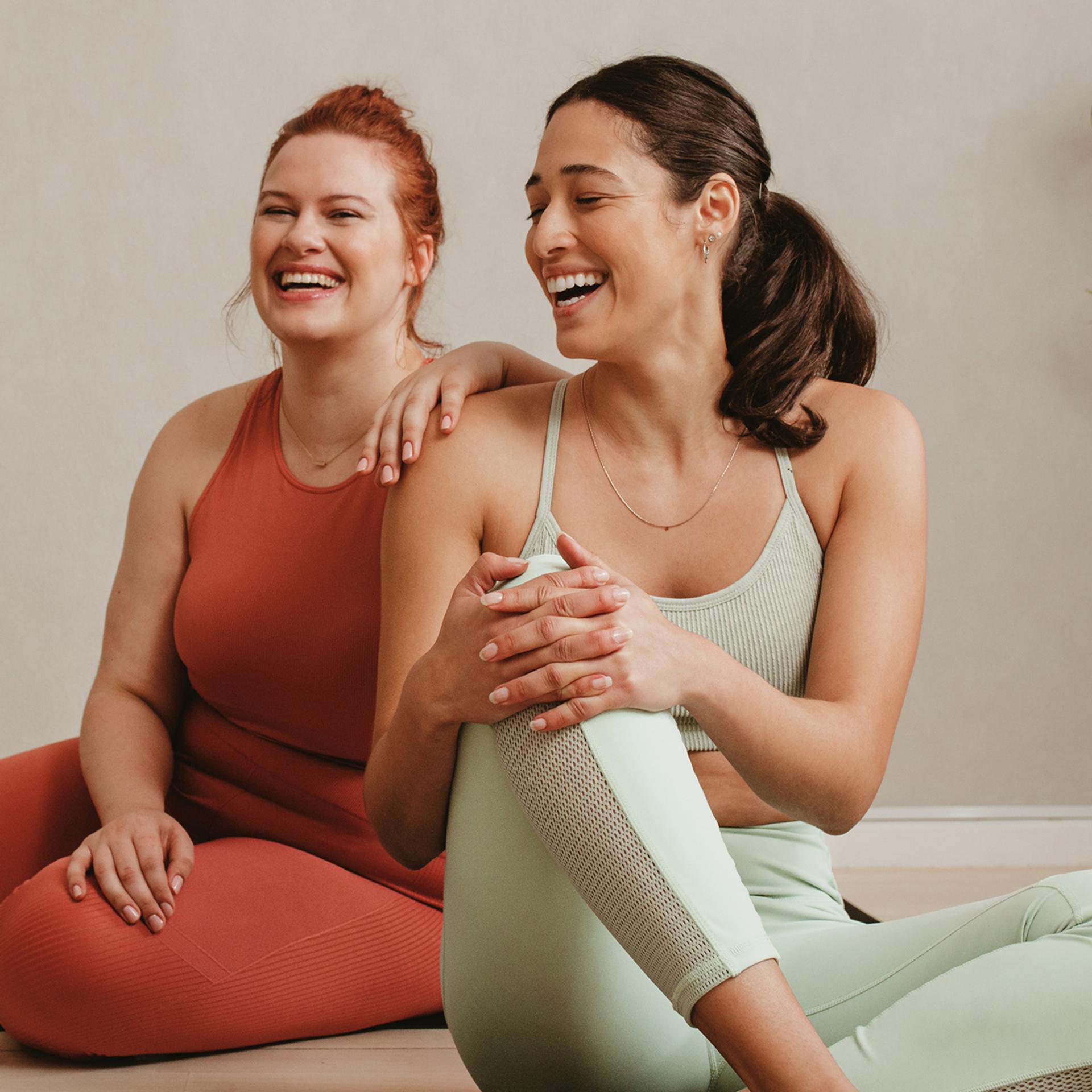 two women laughing