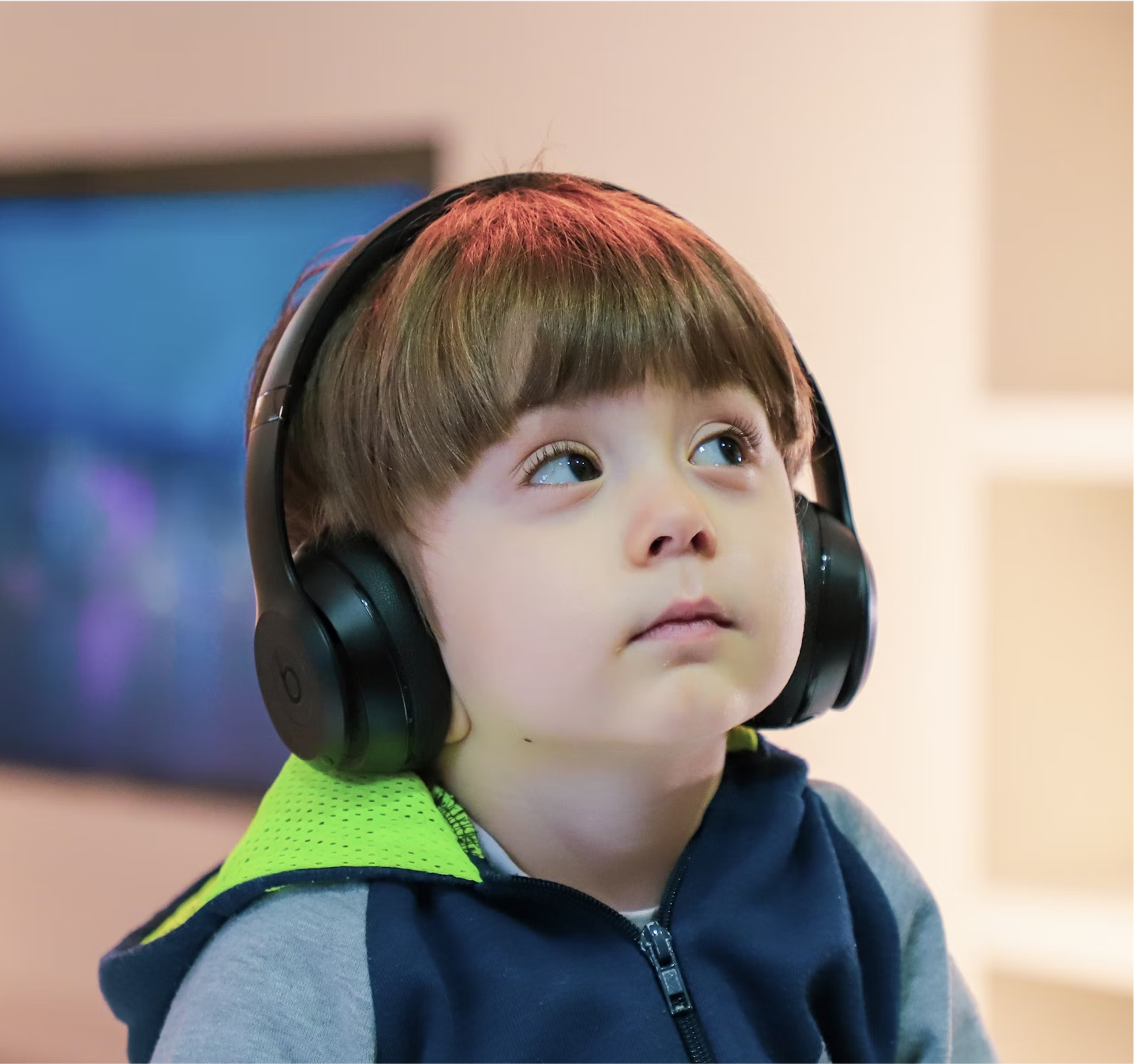 child wearing headphones