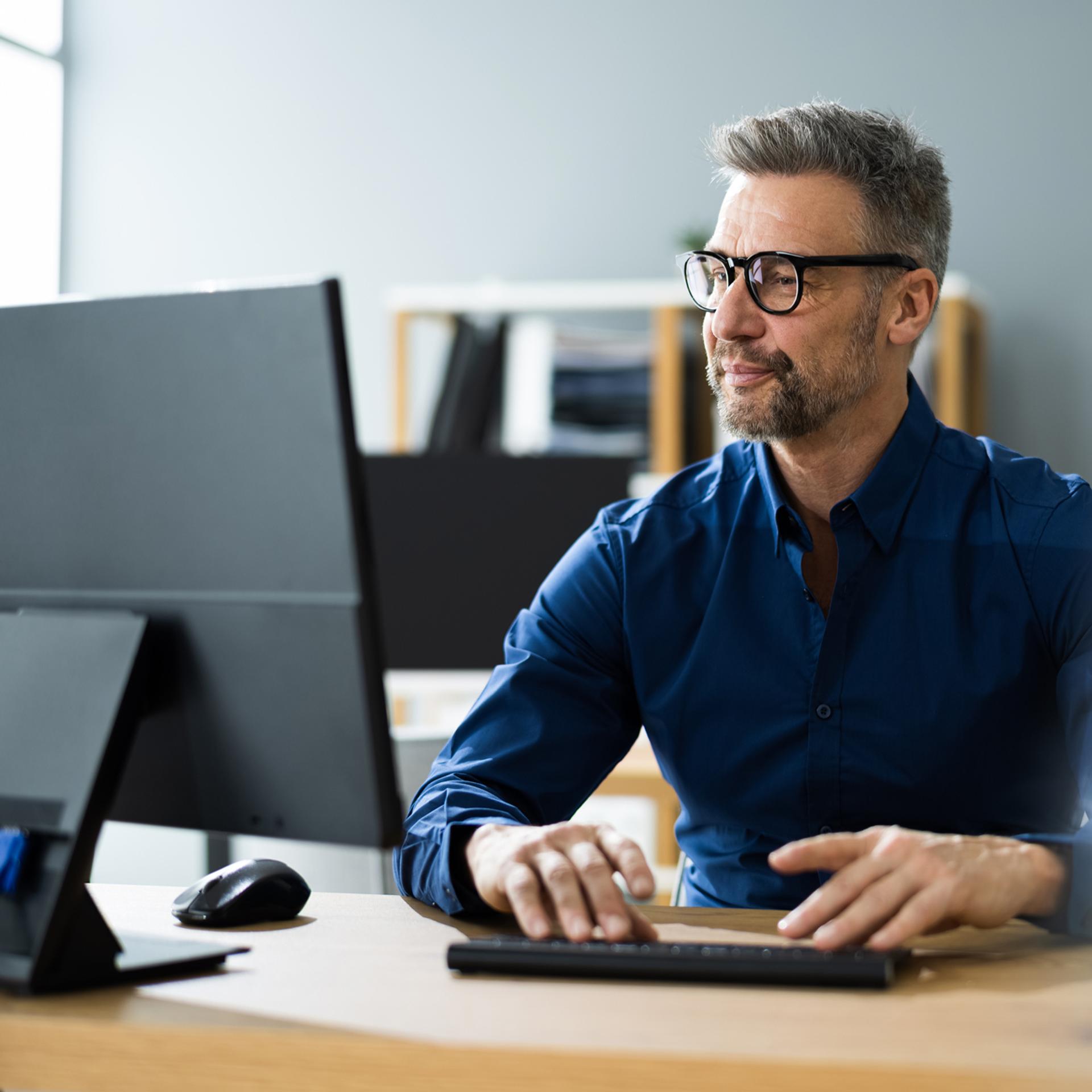 man working at computer