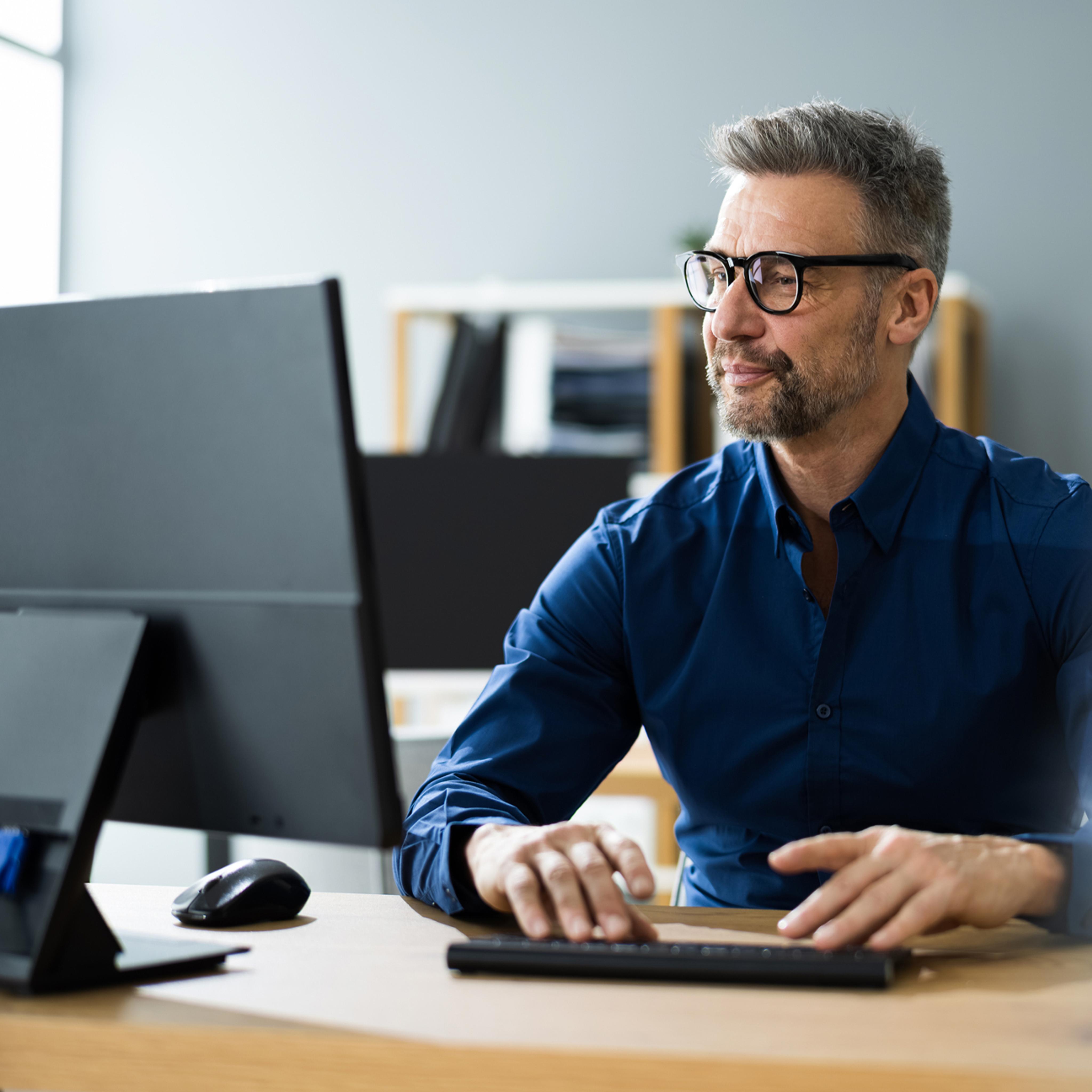 man working at computer