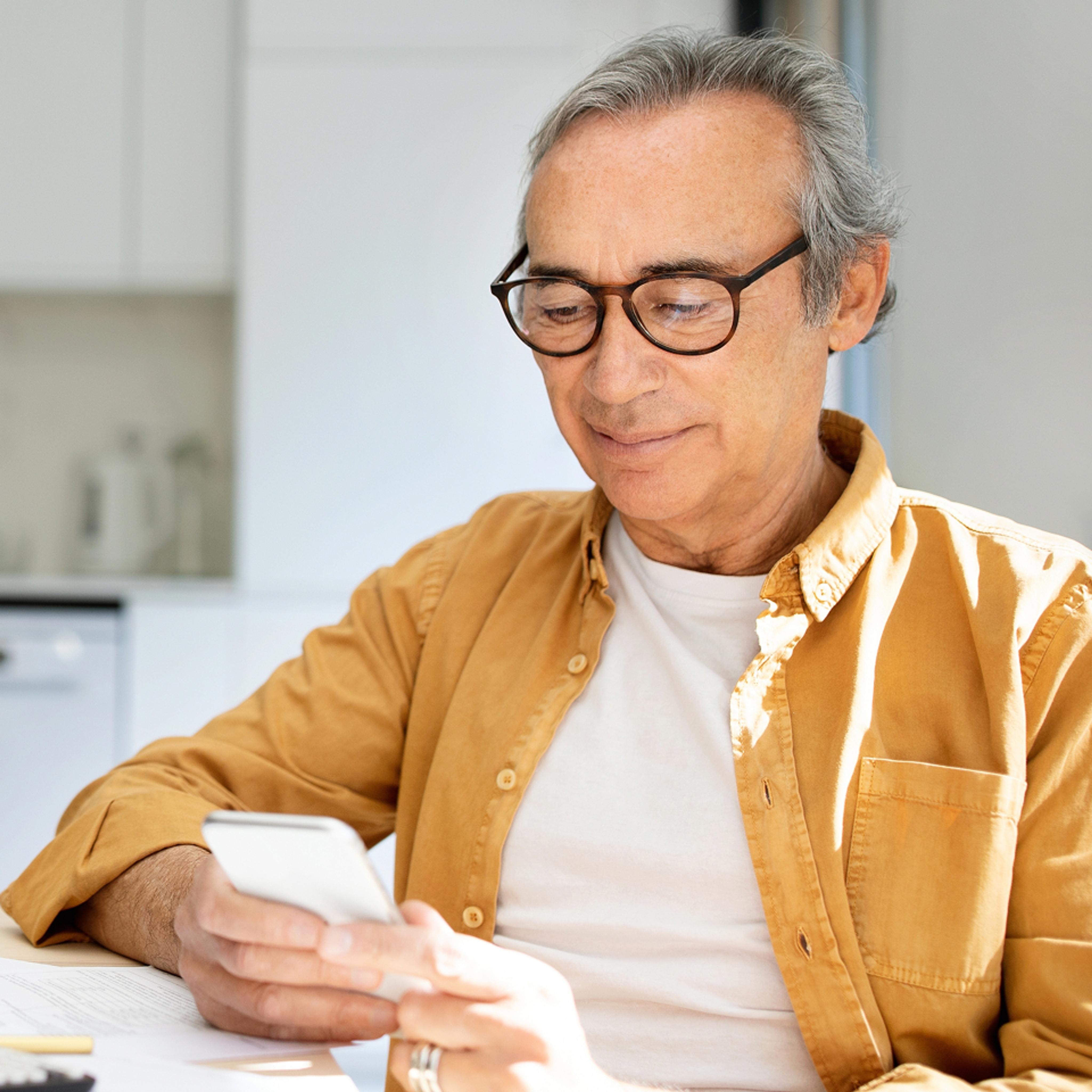 man looking at phone