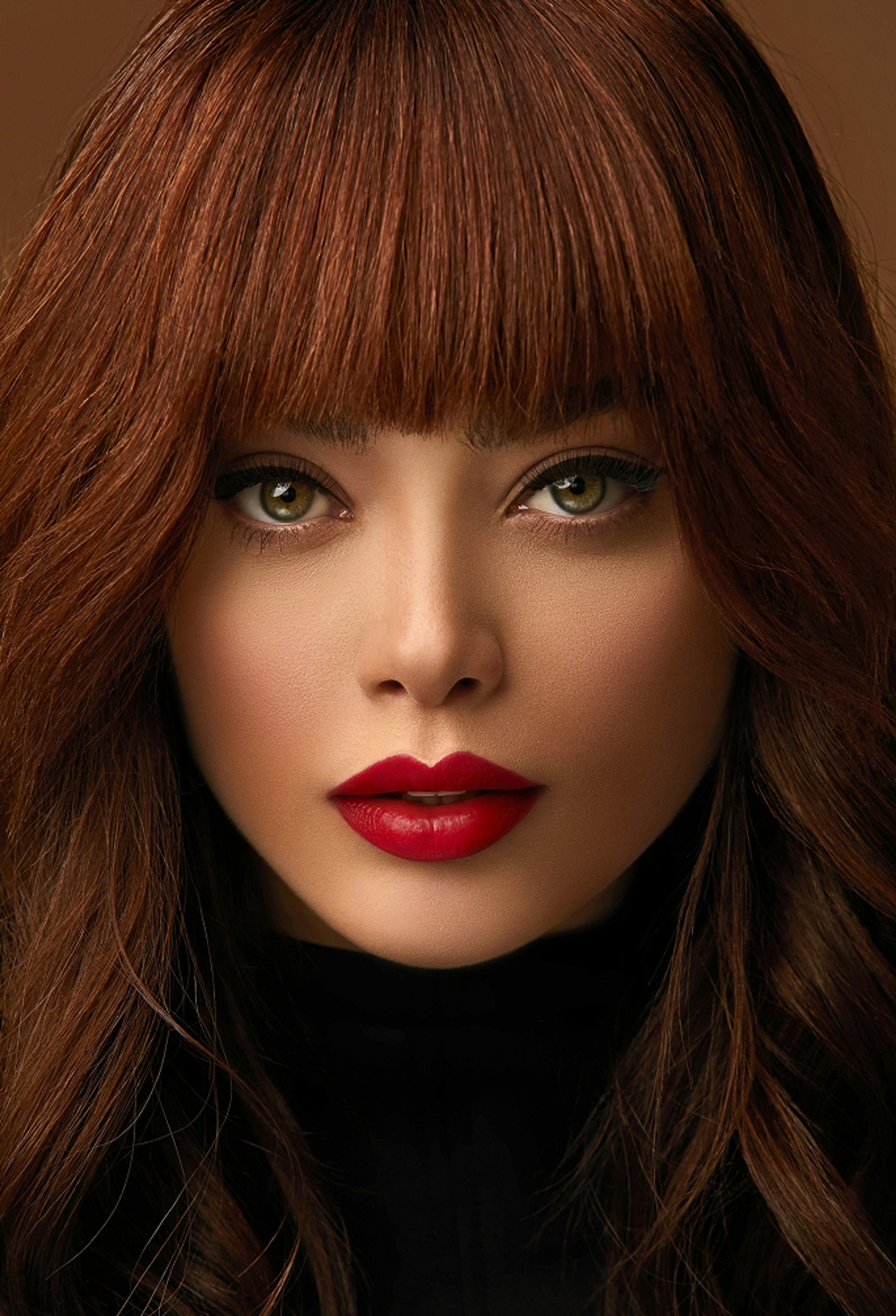 Close-up of a woman’s lips with smooth skin and bright red lipstick