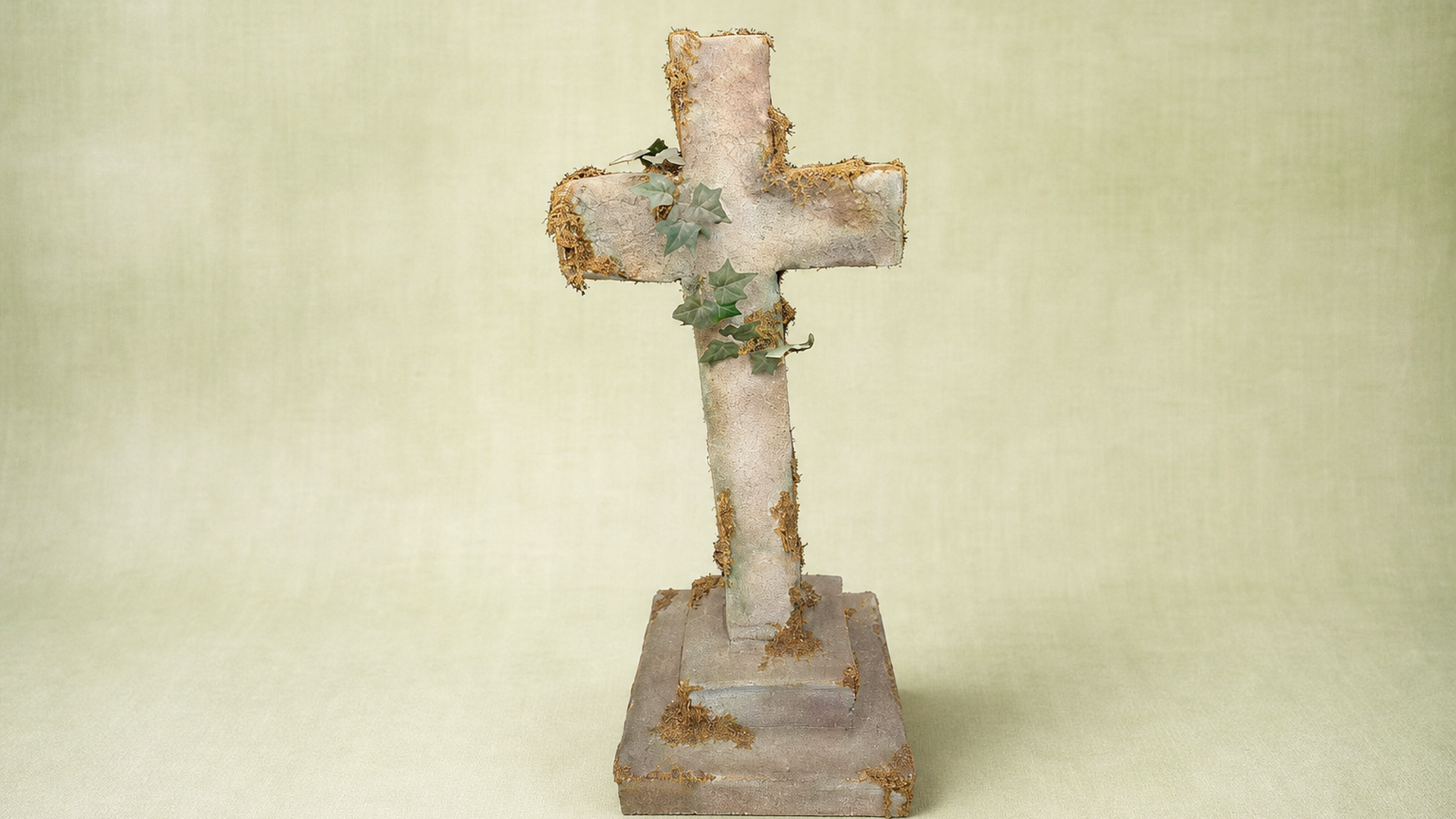 Aged Moss-Covered Cemetery Cross Grave
