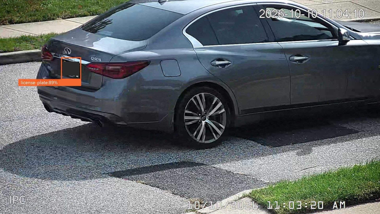 Daytime capture from my license plate camera with the Blue Iris detection box (plate redacted)