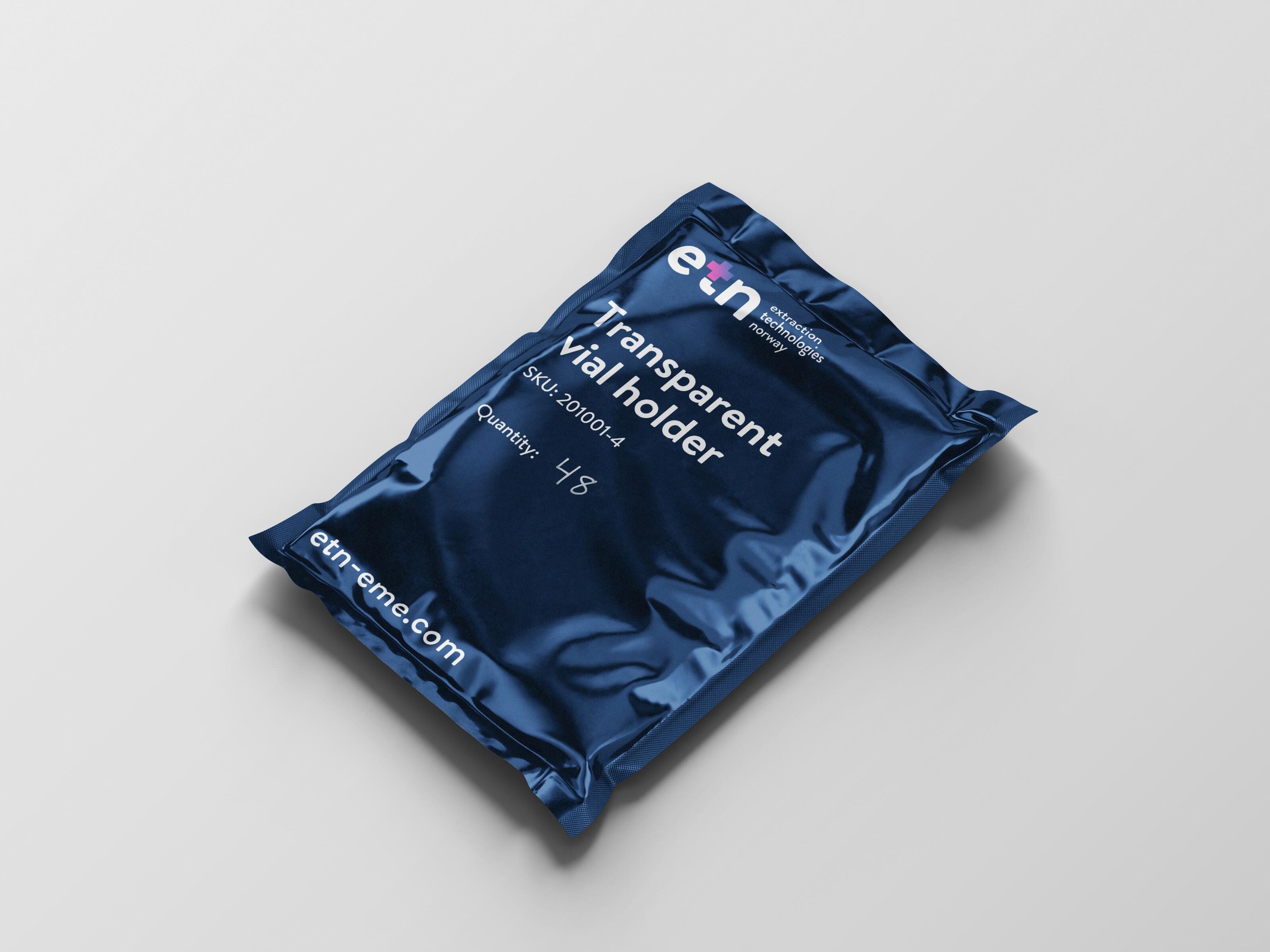 Blue metallic package labeled 'Transparent vial holder' with quantity 48 and etn-eme.com website.