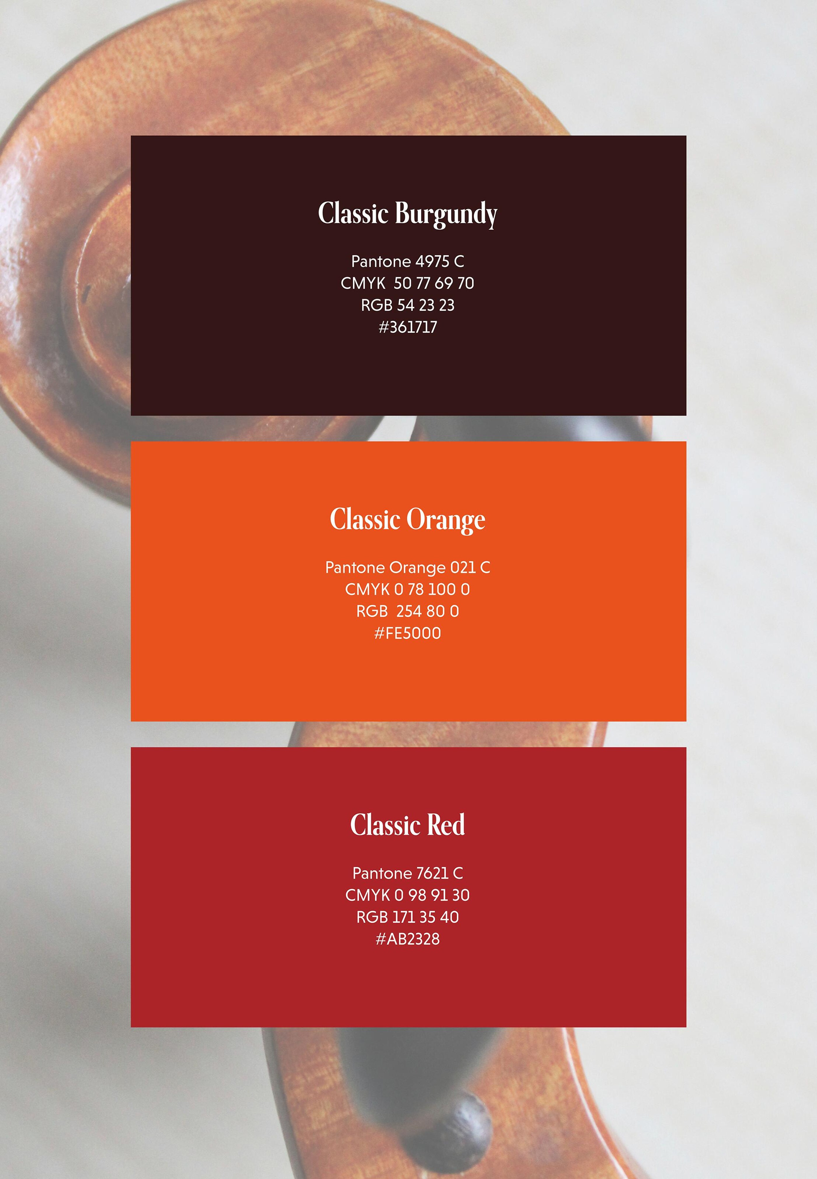 Three brand colour swatches named Classic Burgundy, Classic Orange and Classic Red, shown over a close-up of a cello.