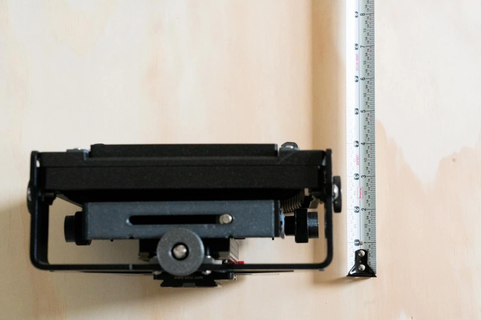 If we’re able to load the large format camera top-down into a camera bag, we could substantially save on space—meaning smaller camera bag and potentially more protection.