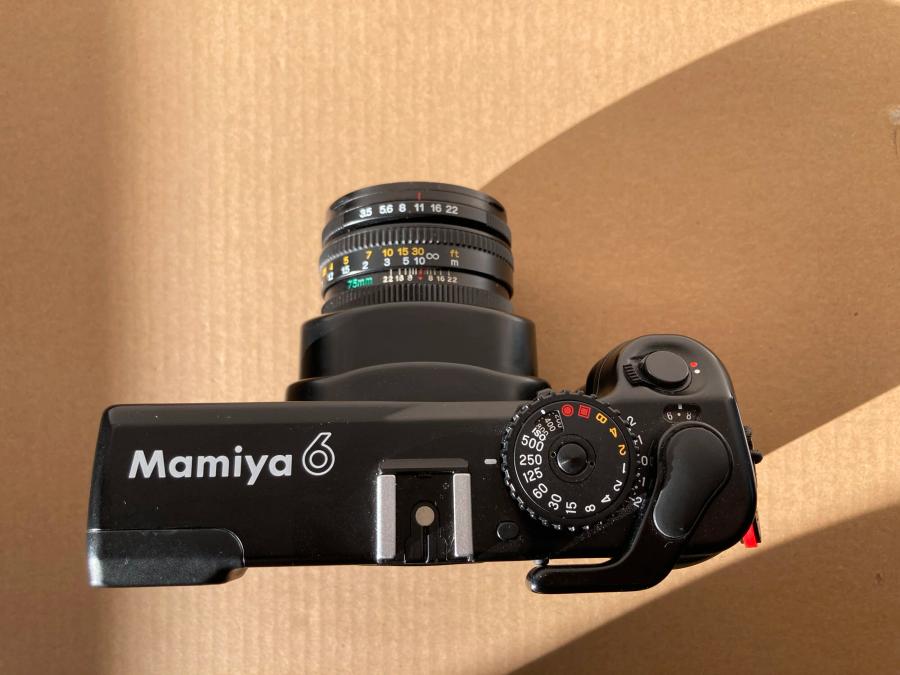 Mamiya 6 - active position. Getting the camera to this position means that I would have already removed the lens cover in the same motion as expanding the bellows. What this tells me is that any time I see the camera in this state, it should be ready to shoot.